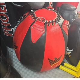 שק אגרוף עור מקצועי 250021 דגם ROUND BAG באורך 70 ס"מ, קוטר 175 ס"מ, משקל כ- 55 ק"ג מבית FINIQA